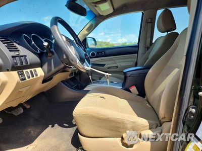 Zdjęcie 7 z 12 samochodu: 2012 TOYOTA TACOMA V6 VIN:3TMLU4EN6CM100926 - miniatura