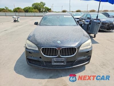 Piąte zdjęcie samochodu w środku: 2014 BMW 750 LXI VIN:WBAYF8C58ED142486 - miniatura