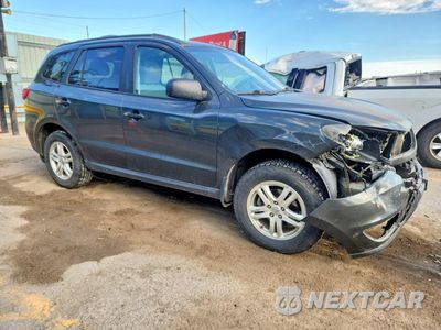Czwarte zdjęcie samochodu z boku: 2012 HYUNDAI SANTA FE GLS VIN:5XYZG3AB1CG111708 - miniatura
