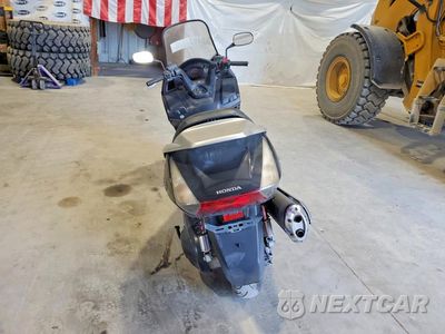 Czwarte zdjęcie samochodu z boku: 2013 HONDA FSC600 A VIN:JH2PF0147DK100239 - miniatura
