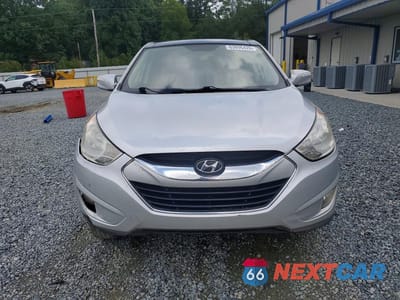 Piąte zdjęcie samochodu w środku: 2010 HYUNDAI TUCSON LIMITED VIN:KM8JU3AC8AU060097 - miniatura
