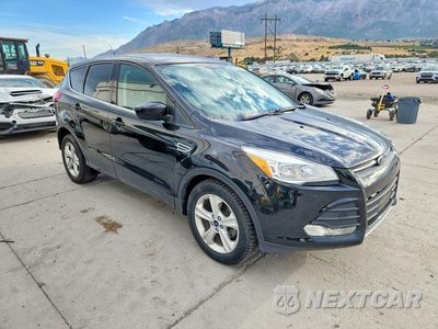Czwarte zdjęcie samochodu z boku: 2015 FORD ESCAPE SE VIN:1FMCU0G79FUB69595 - miniatura