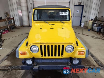 Piąte zdjęcie samochodu w środku: 2002 JEEP WRANGLER / TJ SPORT VIN:1J4FA49S12P763846 - miniatura
