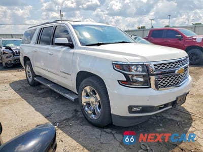 Czwarte zdjęcie samochodu z boku: 2016 CHEVROLET SUBURBAN K1500 LT VIN:1GNSKHKC4GR442589 - miniatura