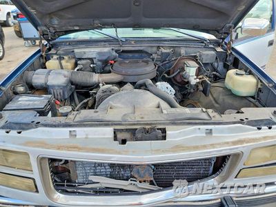 Zdjęcie 11 z 12 samochodu: 1994 GMC SIERRA C1500 VIN:2GTEC19K2R1525571 - miniatura