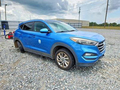 Czwarte zdjęcie samochodu z boku: 2016 HYUNDAI TUCSON SE VIN:KM8J33A46GU140969 - miniatura