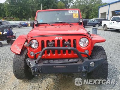 Piąte zdjęcie samochodu w środku: 2017 JEEP WRANGLER UNLIMITED SPORT VIN:1C4BJWDGXHL583607 - miniatura