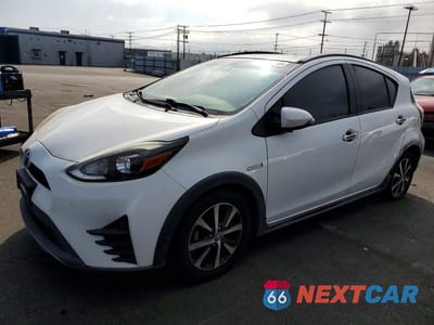 2018 TOYOTA PRIUS C TWO JTDKDTB37J1617283 - główne zdjęcie licytacji z USA - miniatura