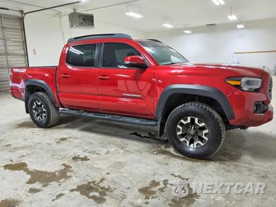 Czwarte zdjęcie samochodu z boku: 2021 TOYOTA TACOMA TRD OFF-ROAD VIN:3TMCZ5ANXMM382292 - miniatura