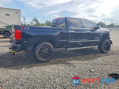 Trzecie zdjęcie samochodu z tyłu: 2019 CHEVROLET SILVERADO K2500 HEAVY DUTY LTZ VIN:1GC1KTEY5KF210382 - miniatura