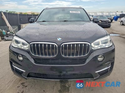 Piąte zdjęcie samochodu w środku: 2017 BMW X5 XDR40E VIN:5UXKT0C50H0S80567 - miniatura