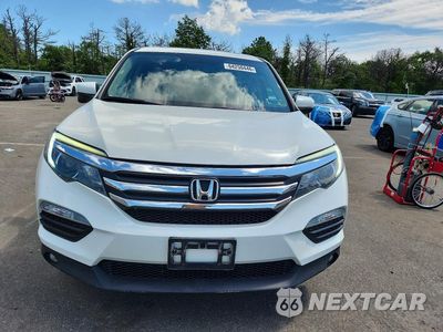 Piąte zdjęcie samochodu w środku: 2017 HONDA PILOT EXL VIN:5FNYF6H81HB096250 - miniatura