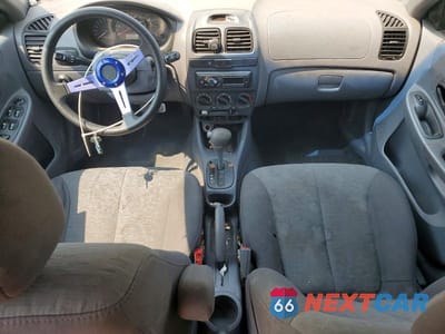Zdjęcie 8 z 12 samochodu: 2005 HYUNDAI ACCENT GLS VIN:KMHCG45C75U615580 - miniatura