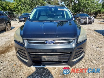 Piąte zdjęcie samochodu w środku: 2014 FORD ESCAPE TITANIUM VIN:1FMCU0J99EUA94583 - miniatura