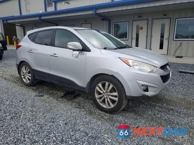 Czwarte zdjęcie samochodu z boku: 2010 HYUNDAI TUCSON LIMITED VIN:KM8JU3AC8AU060097 - miniatura