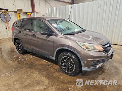 Czwarte zdjęcie samochodu z boku: 2016 HONDA CR-V SE VIN:2HKRM4H43GH702563 - miniatura