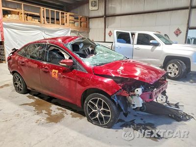 Czwarte zdjęcie samochodu z boku: 2016 FORD FOCUS SE VIN:1FADP3F20GL355983 - miniatura