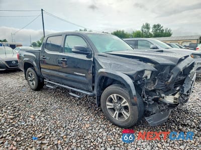 Czwarte zdjęcie samochodu z boku: 2017 TOYOTA TACOMA TRD SPORT VIN:3TMCZ5AN6HM049710 - miniatura