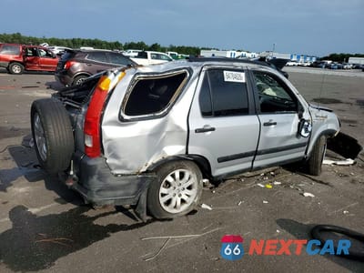 Trzecie zdjęcie samochodu z tyłu: 2004 HONDA CR-V EX VIN:SHSRD778X4U247106 - miniatura