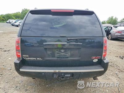 Zdjęcie 6 z 13 samochodu: 2012 GMC YUKON XL DENALI VIN:1GKS2MEF2CR232238 - miniatura