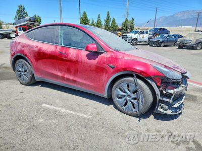 Czwarte zdjęcie samochodu z boku: 2024 TESLA MODEL Y VIN:7SAYGDEDXRF193356 - miniatura
