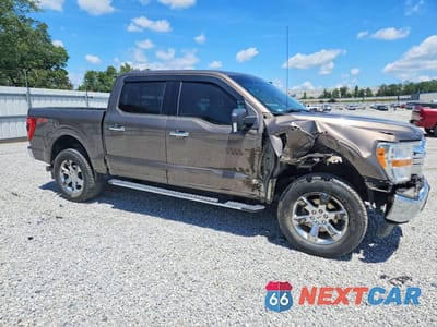 Czwarte zdjęcie samochodu z boku: 2021 FORD F150 XLT VIN:1FTFW1E55MKD79851 - miniatura