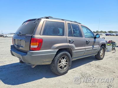 Trzecie zdjęcie samochodu z tyłu: 2002 JEEP GRAND CHEROKEE LAREDO VIN:1J8GX48S12C121959 - miniatura