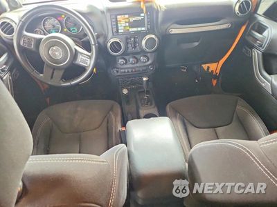 Zdjęcie 8 z 12 samochodu: 2013 JEEP WRANGLER UNLIMITED SAHARA VIN:1C4BJWEG2DL562386 - miniatura