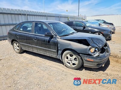 Czwarte zdjęcie samochodu z boku: 2006 HYUNDAI ELANTRA GLS VIN:KMHDN56D16U181522 - miniatura