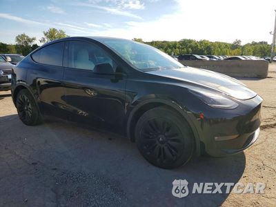 Czwarte zdjęcie samochodu z boku: 2023 TESLA MODEL Y VIN:7SAYGDEE7PF858283 - miniatura