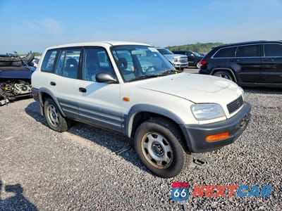 Czwarte zdjęcie samochodu z boku: 1996 TOYOTA RAV4 BASE VIN:JT3GP10V2T7004756 - miniatura