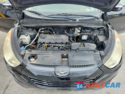Zdjęcie 12 z 13 samochodu: 2013 HYUNDAI TUCSON GLS VIN:KM8JU3AC7DU715161 - miniatura