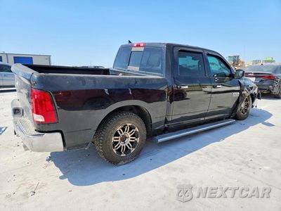 Trzecie zdjęcie samochodu z tyłu: 2015 RAM 1500 SLT VIN:1C6RR6LTXFS604908 - miniatura