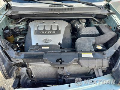 Zdjęcie 11 z 12 samochodu: 2006 HYUNDAI TUCSON GLS VIN:KM8JN12D16U262683 - miniatura