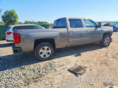 Trzecie zdjęcie samochodu z tyłu: 2017 CHEVROLET SILVERADO K1500 LT VIN:3GCUKREC5HG312051 - miniatura