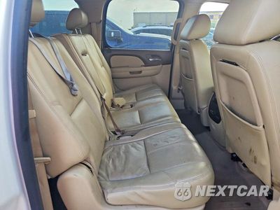 Zdjęcie 11 z 13 samochodu: 2010 CHEVROLET SUBURBAN K1500 LT VIN:1GNUKJE32AR139300 - miniatura