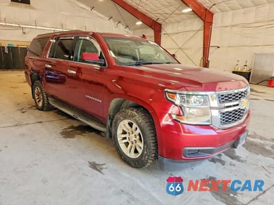 Czwarte zdjęcie samochodu z boku: 2016 CHEVROLET SUBURBAN K1500 LT VIN:1GNSKHKC5GR161014 - miniatura