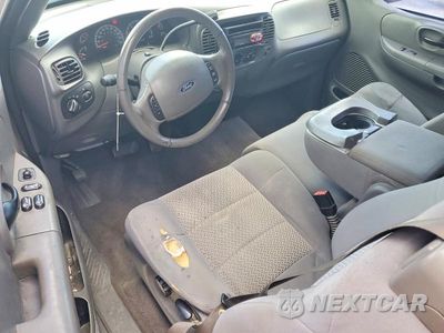 Zdjęcie 8 z 12 samochodu: 2003 FORD F150 VIN:1FTRX17243NA53873 - miniatura