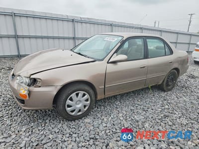 2002 TOYOTA COROLLA LE 2T1BR12E72C527412 - główne zdjęcie licytacji z USA - miniatura
