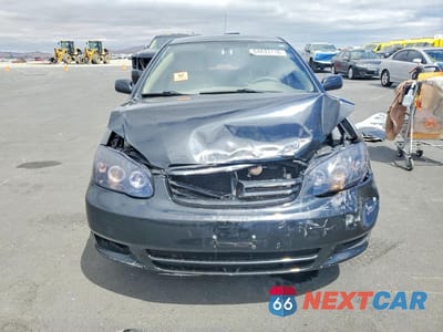 Piąte zdjęcie samochodu w środku: 2003 TOYOTA COROLLA CE VIN:JTDBR32E330002368 - miniatura