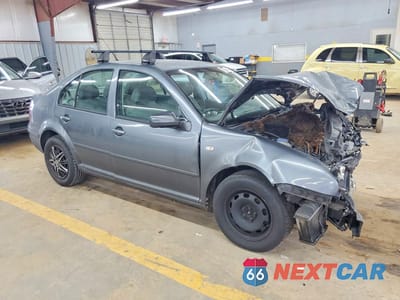 Czwarte zdjęcie samochodu z boku: 2003 VOLKSWAGEN JETTA GL TDI VIN:3VWRP69M43M109104 - miniatura