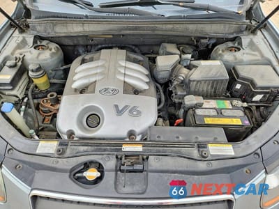 Zdjęcie 12 z 13 samochodu: 2007 HYUNDAI SANTA FE SE VIN:5NMSH13E17H024879 - miniatura