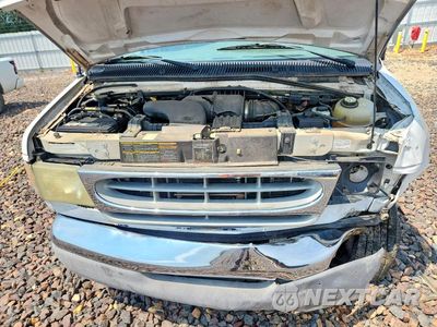 Zdjęcie 12 z 13 samochodu: 2002 FORD ECONOLINE E350 SUPER DUTY WAGON VIN:1FBSS31S22HB42735 - miniatura