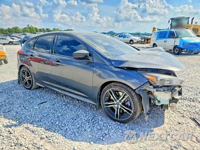 Czwarte zdjęcie samochodu z boku: 2017 FORD FOCUS ST VIN:1FADP3L98HL322488 - miniatura