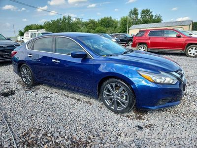 Czwarte zdjęcie samochodu z boku: 2018 NISSAN ALTIMA 2.5 SR VIN:1N4AL3AP1JC296807 - miniatura