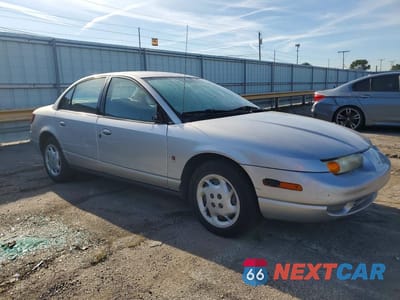 Czwarte zdjęcie samochodu z boku: 2002 SATURN SL2 VIN:1G8ZK52792Z285797 - miniatura