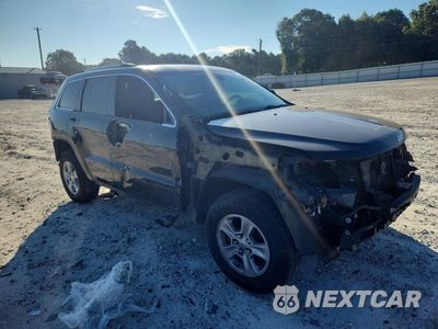 Czwarte zdjęcie samochodu z boku: 2017 JEEP GRAND CHEROKEE LAREDO VIN:1C4RJFAG6HC671301 - miniatura