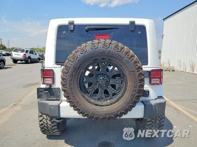 Zdjęcie 6 z 12 samochodu: 2013 JEEP WRANGLER UNLIMITED SAHARA VIN:1C4HJWEG2DL546568 - miniatura