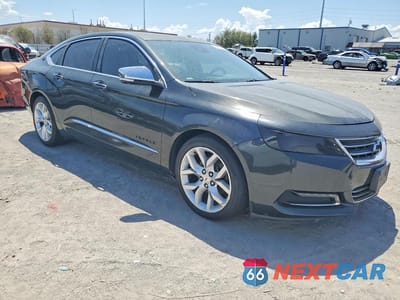 Czwarte zdjęcie samochodu z boku: 2014 CHEVROLET IMPALA LTZ VIN:1G1155S36EU170429 - miniatura
