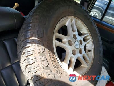 Zdjęcie 13 z 14 samochodu: 1999 JEEP GRAND CHEROKEE LIMITED VIN:1J4GW68N5XC547087 - miniatura